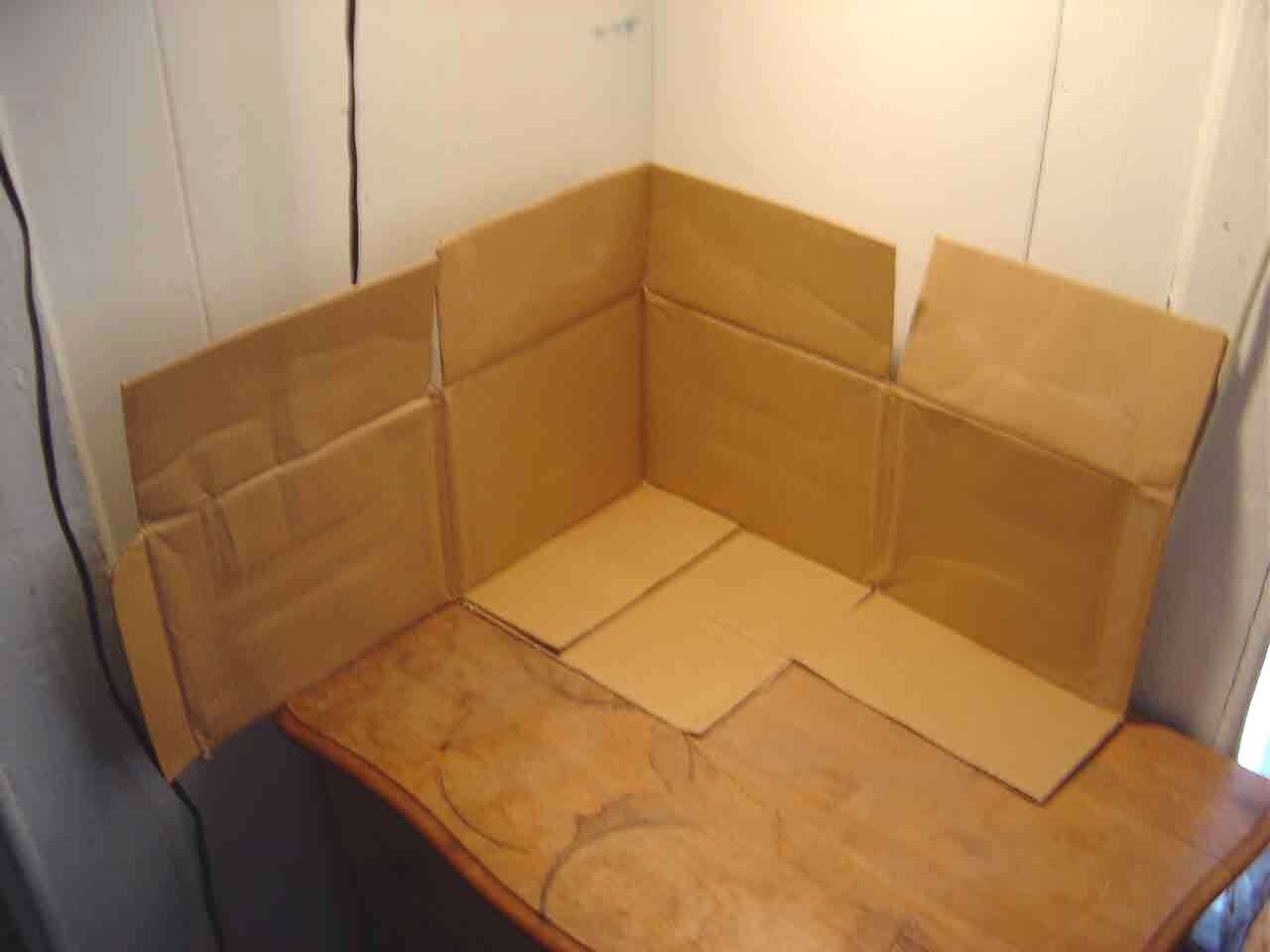 SUBJECT: shipping carton opened into a three-corner foundation structure

CAMERA:  Sony DSC-P92 Cyber-shot
MEDIA:  Sony MSA-64A Memory Stick at 1.2 megapixel resolution
FILE:  JPEG from Sony Image Transfer version 1.00.1015.01
EDITING:  Adobe Photoshop