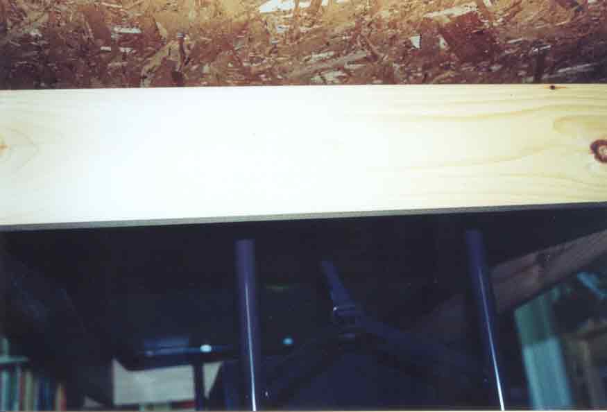 SUBJECT: baseboard underside, showing 'box cover' construction 

CAMERA:  Canon EOS Rebel-X SLR
MEDIA:  Kodak ISO 400 4-inch by 6-inch glossy print
FILE:  JPEG from HP 4100C scanner
EDITING:  Adobe Photoshop