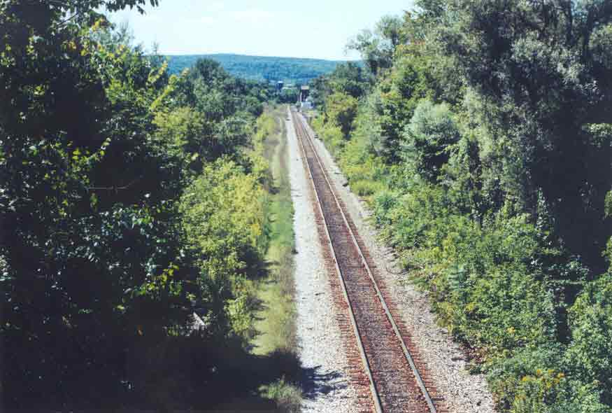 SUBJECT: Canadian Pacific Railway tracks, Cobleskill, New York, USA 

CAMERA:  Canon EOS Rebel-X SLR
MEDIA:  Kodak ISO 400 4-inch by 6-inch glossy print
FILE:  JPEG from HP 4100C scanner
EDITING:  Adobe Photoshop