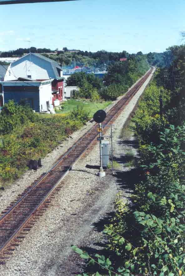 SUBJECT: Canadian Pacific Railway tracks, Cobleskill, New York, USA 

CAMERA:  Canon EOS Rebel-X SLR
MEDIA:  Kodak ISO 400 4-inch by 6-inch glossy print
FILE:  JPEG from HP 4100C scanner
EDITING:  Adobe Photoshop