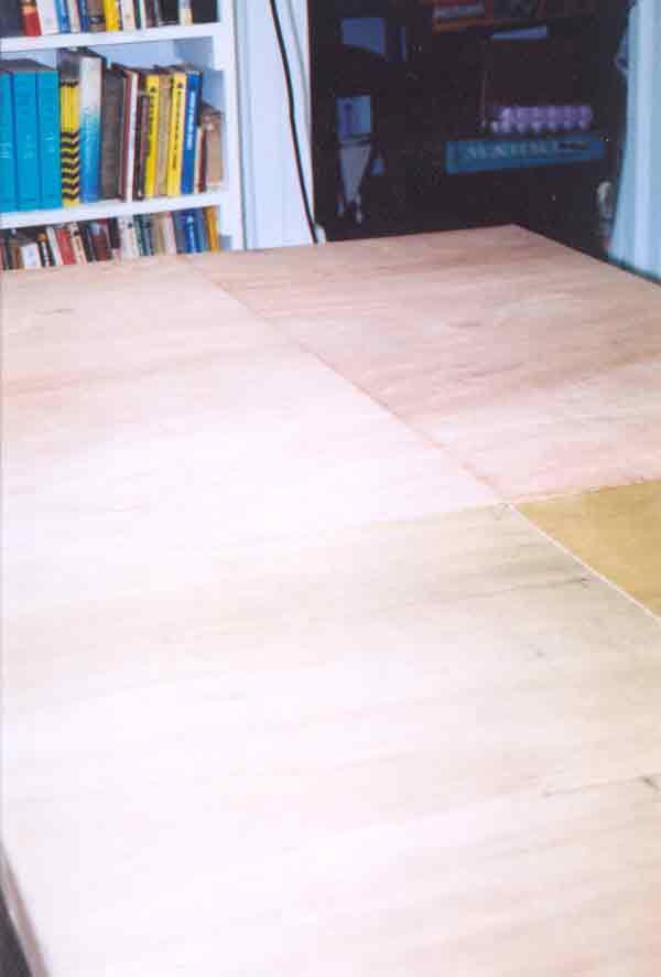 SUBJECT: plywood 'quarter panels' placed upon baseboard 

CAMERA:  Canon EOS Rebel-X SLR
MEDIA:  Kodak ISO 400 4-inch by 6-inch glossy print
FILE:  JPEG from HP 4100C scanner
EDITING:  Adobe Photoshop