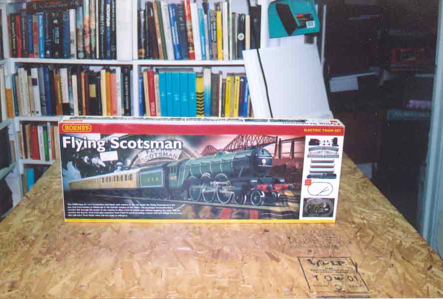 SUBJECT: Hornby 'Flying Scotsman' train set box 

CAMERA:  Canon EOS Rebel-X SLR
MEDIA:  Kodak ISO 400 4-inch by 6-inch glossy print
FILE:  JPEG from HP 4100C scanner
EDITING:  Adobe Photoshop