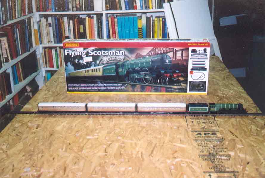 SUBJECT: Hornby 'Flying Scotsman' train set box with train 

CAMERA:  Canon EOS Rebel-X SLR
MEDIA:  Kodak ISO 400 4-inch by 6-inch glossy print
FILE:  JPEG from HP 4100C scanner
EDITING:  Adobe Photoshop