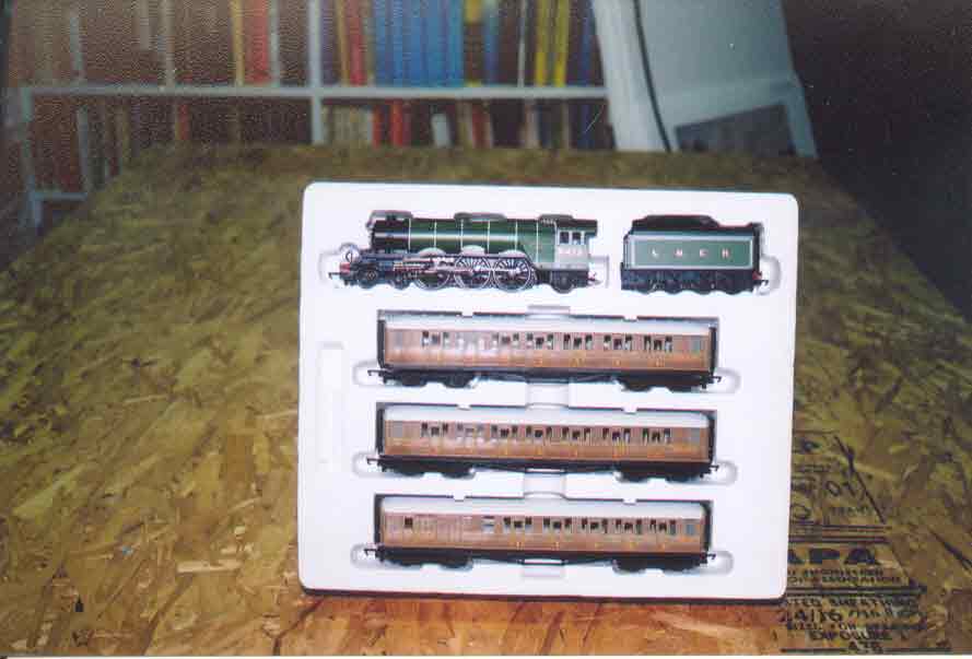 SUBJECT: Hornby 'Flying Scotsman' train set in foam packaging 

CAMERA:  Canon EOS Rebel-X SLR
MEDIA:  Kodak ISO 400 4-inch by 6-inch glossy print
FILE:  JPEG from HP 4100C scanner
EDITING:  Adobe Photoshop