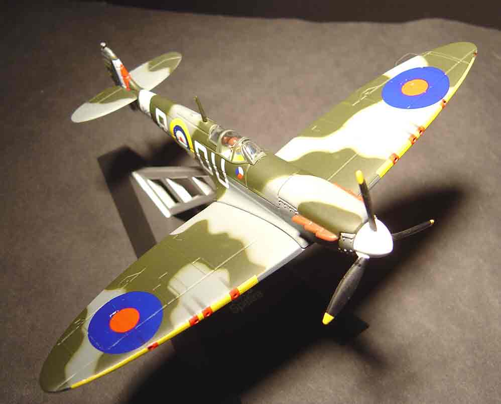 SUBJECT: 1/32 scale model Supermarine Mk II Spitfire, floodlamp illumination

CAMERA:  Sony DSC-P92 Cyber-shot
MEDIA:  Sony MSA-64A Memory Stick at 1.2 megapixel resolution
FILE:  JPEG from Sony Image Transfer version 1.00.1015.01
EDITING:  Adobe Photoshop