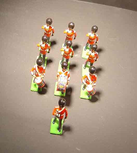 SUBJECT: Formation of toy soldiers illuminated by key light and fill light

CAMERA:  Sony DSC-P92 Cyber-shot
MEDIA:  Sony MSA-64A Memory Stick at 1.2 megapixel resolution
FILE:  JPEG from Sony Image Transfer version 1.00.1015.01
EDITING:  Adobe Photoshop