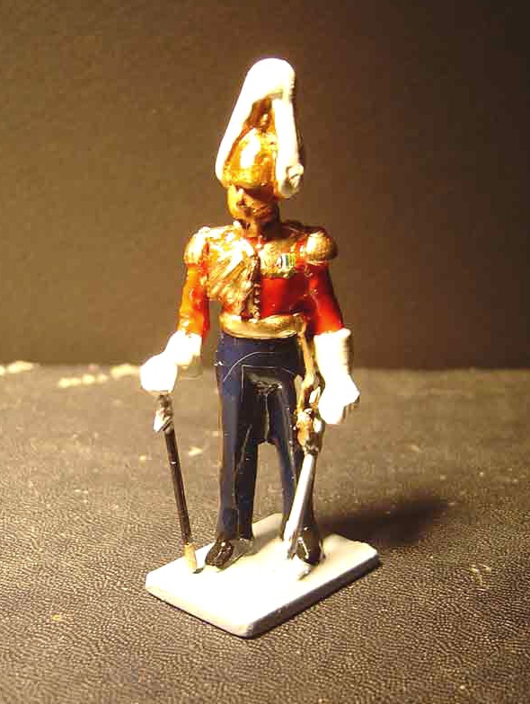 SUBJECT: 1/32 scale figure, Honorable Corps of Gentleman-at-Arms, floodlamp illumination 

CAMERA:  Sony DSC-P92 Cyber-shot
MEDIA:  Sony MSA-64A Memory Stick at 1.2 megapixel resolution
FILE:  JPEG from Sony Image Transfer version 1.00.1015.01
EDITING:  Adobe Photoshop